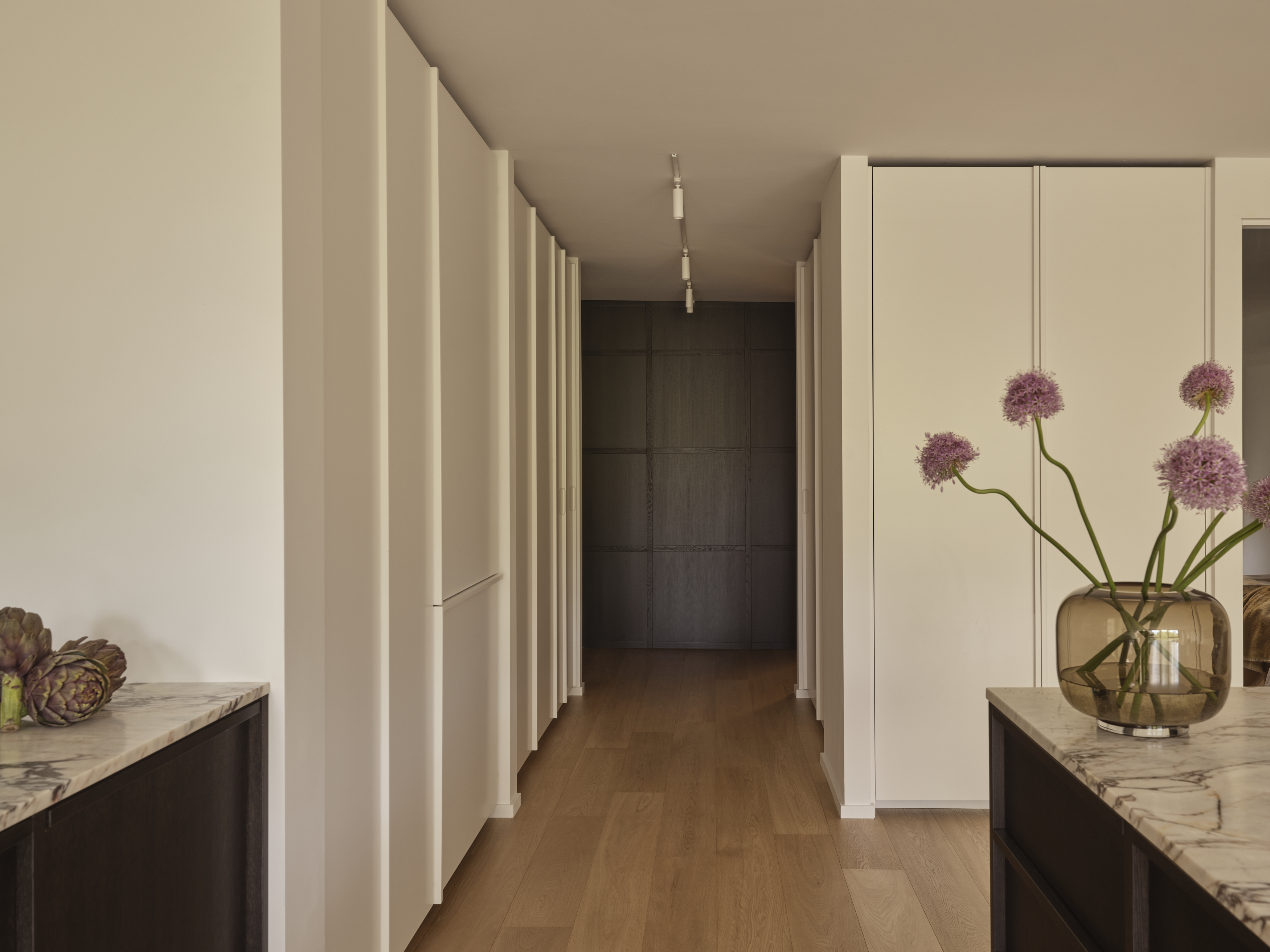 Carbon-stained oak pivot doors in Suite 514 at 225 Davenport Road